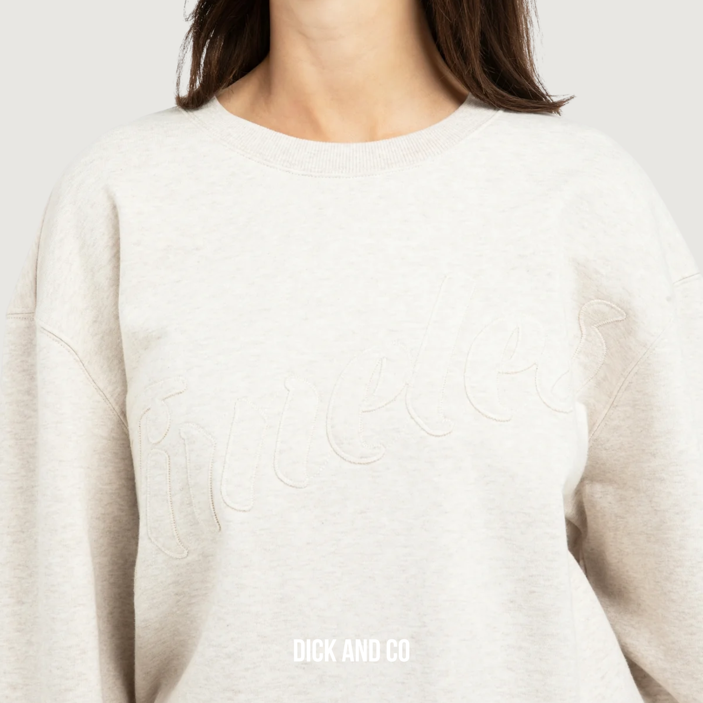 Sweater met opgestikte tekst