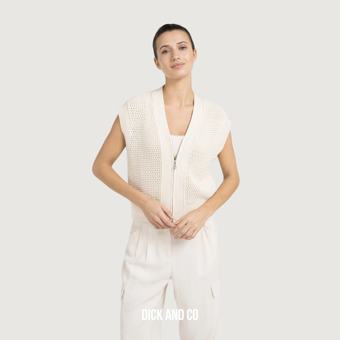 Mouwloos grofgebreid vest met rits