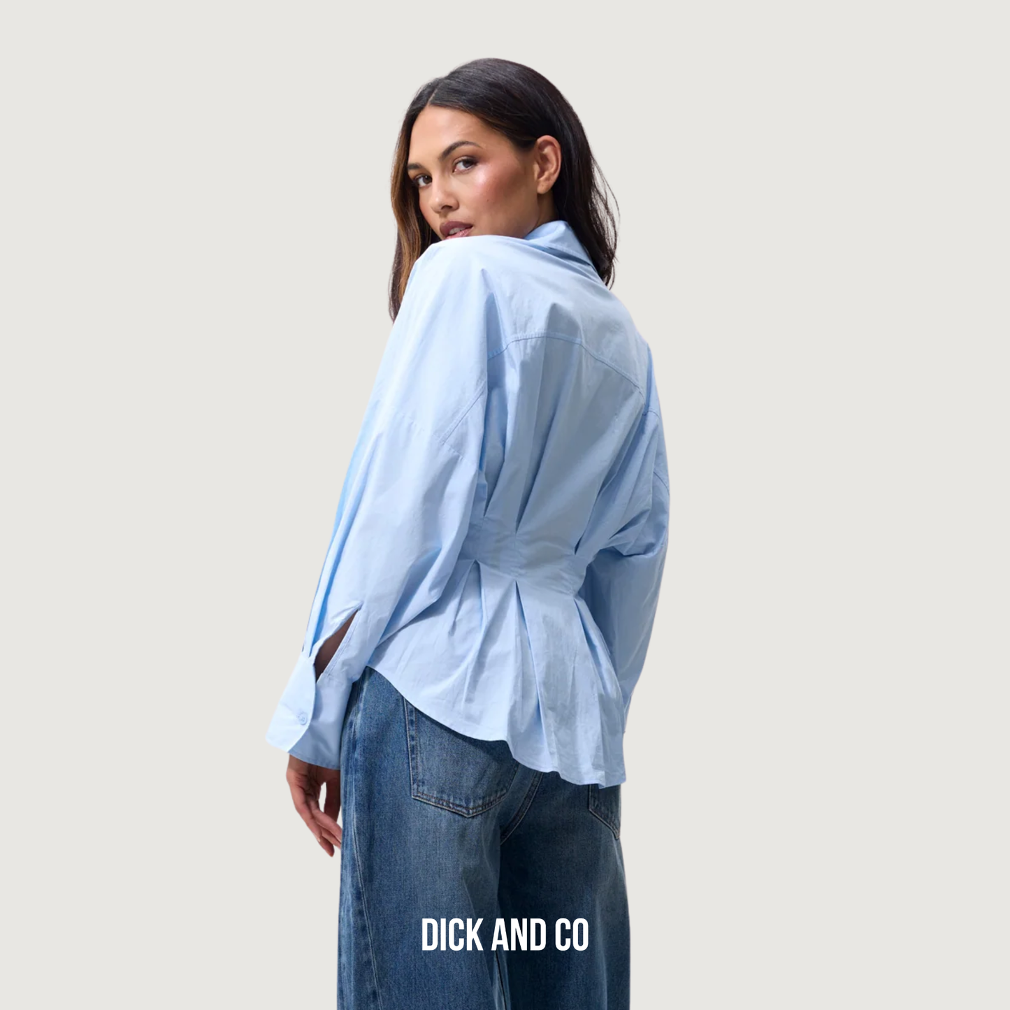 Blouse with waist pleats