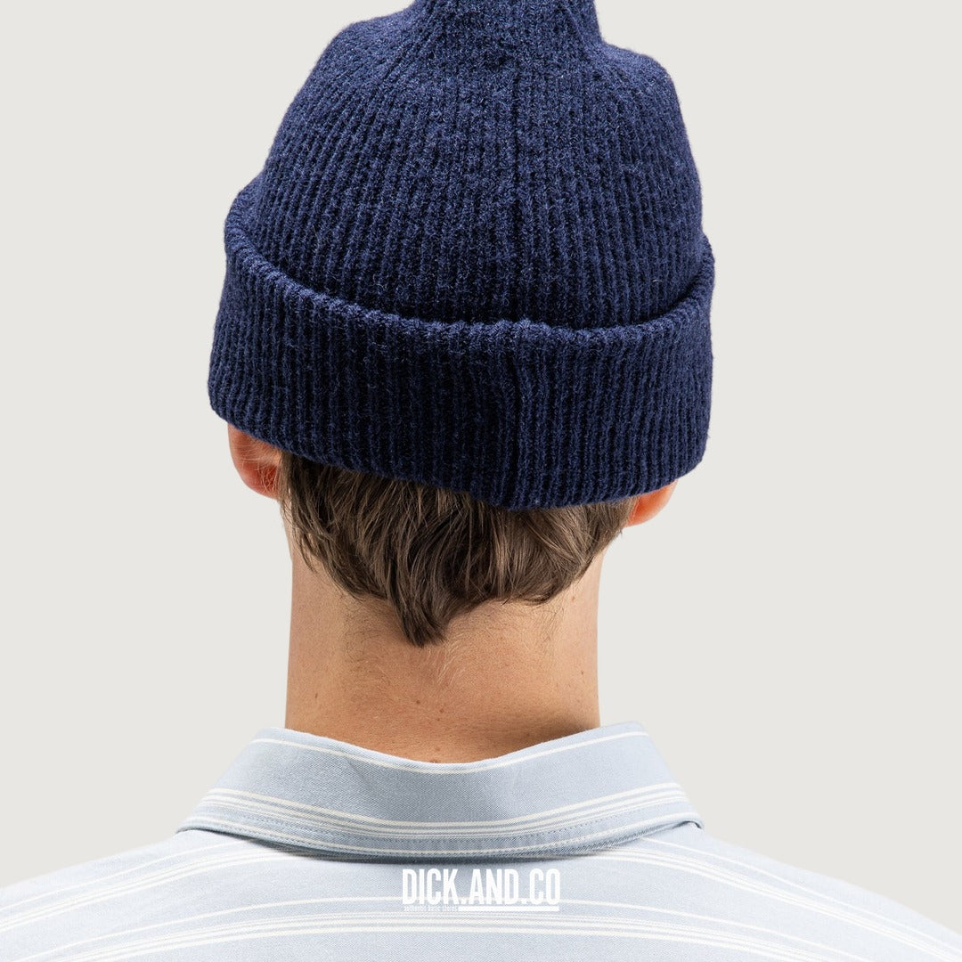 BUTCHER OF BLUE Army Wool Hook Beanie in Alaska Blue (blauw), gedragen door een model, achteraanzicht
